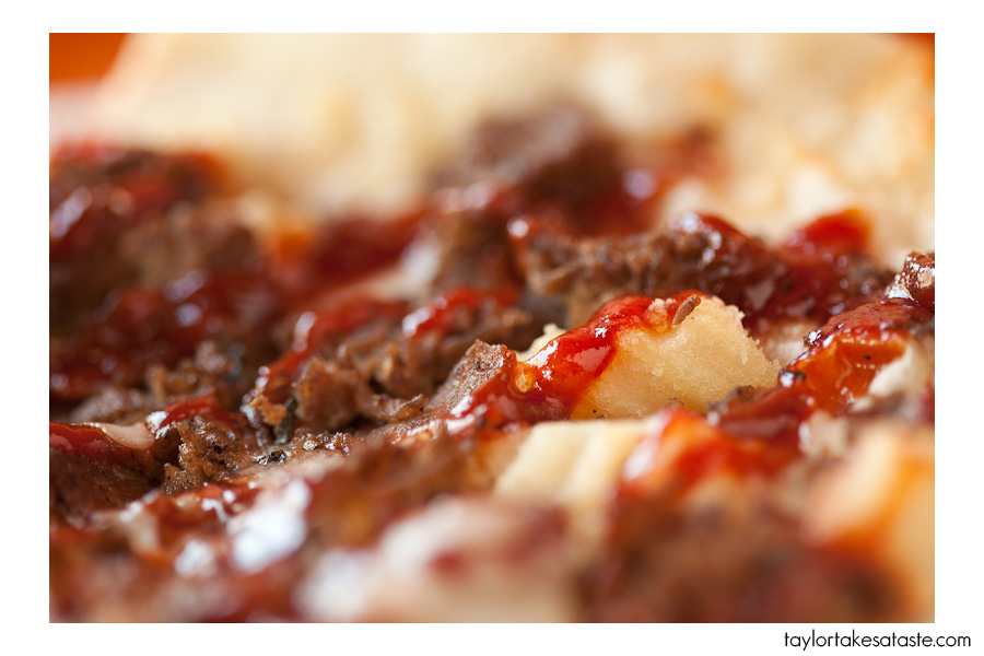 Look at the french fries and steak covered in BBQ sauce!